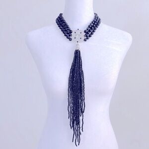 Natural Beaded choker, decorative rhinestone medallion and long tassel detail